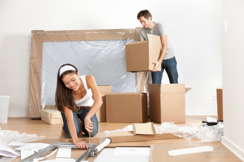 Removal team planning a move in a Muswell Hill street