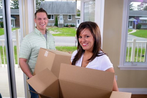 Packed business boxes and office items ready for transport