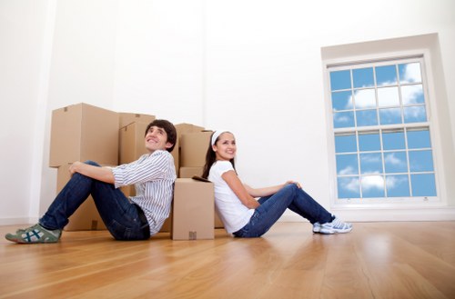 Moving van and packed boxes for a home move in Muswell Hill